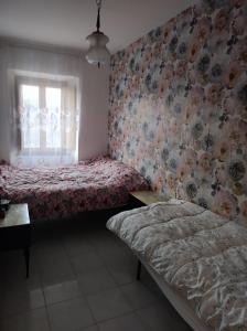 Postel nebo postele na pokoji v ubytování Casa sulla Scarpata
