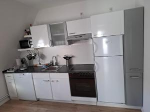 Kuchyň nebo kuchyňský kout v ubytování Blickpunkt + 13 fotografií