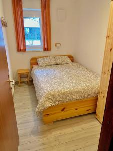 Postel nebo postele na pokoji v ubytování Apartma EMI