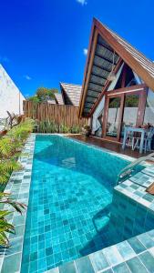 Pousada Villa di Luna内部或周边的泳池