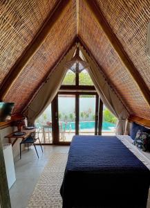 Pousada Villa di Luna客房内的一张或多张床位