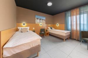 Postel nebo postele na pokoji v ubytování Premium B&B Nova Gorica