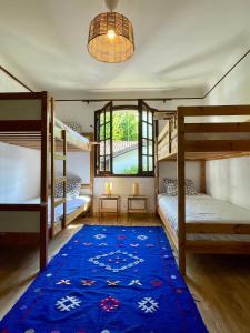 Postel nebo postele na pokoji v ubytování Yacumama Guesthouse