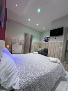 Postel nebo postele na pokoji v ubytování B&b La Ferrovia