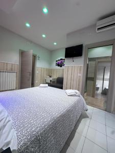 Postel nebo postele na pokoji v ubytování B&b La Ferrovia