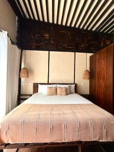 Postel nebo postele na pokoji v ubytování Alquimia Hotel Boutique