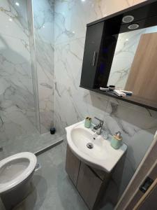 Ένα μπάνιο στο Kallithea Rent