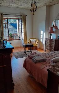 Postel nebo postele na pokoji v ubytování Gîte La Lisière, en Brocéliande
