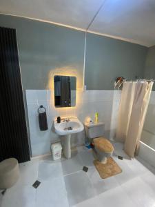 Ένα ή περισσότερα κρεβάτια σε δωμάτιο στο Habitación a 15min del aeropuerto