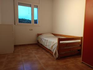 Posteľ alebo postele v izbe v ubytovaní Casa con piscina Sant Pol de Mar
