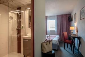 Vannituba majutusasutuses Hotel du Forum