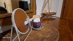 TV a/nebo společenská místnost v ubytování Bed and Breakfast La Reale