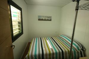 Postel nebo postele na pokoji v ubytování Camping Torrenostra