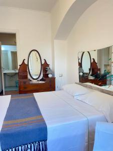 A bed or beds in a room at Camere Francesca