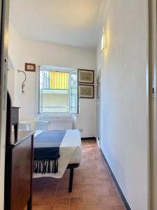 A bed or beds in a room at Camere Francesca
