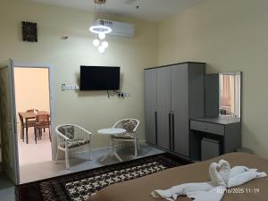 TV o dispositivi per l'intrattenimento presso HAWAKOM JABAL SHAMS REST house