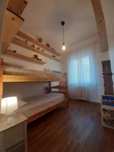 Postel nebo postele na pokoji v ubytování C'era una casa