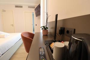 Postel nebo postele na pokoji v ubytování Hotel Miratorre superior