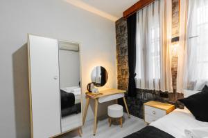 Posezení v ubytování BÜTÜNOĞLU PANSİYON