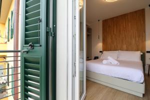 Postel nebo postele na pokoji v ubytování Hotel Miratorre superior