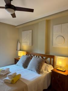 Una cama o camas en una habitación de Sol de Denia