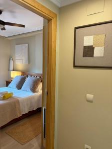 Una cama o camas en una habitación de Sol de Denia