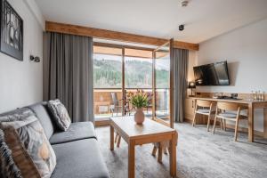 TV a/nebo společenská místnost v ubytování Hotel Litworowy Staw
