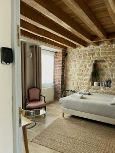 Ένα ή περισσότερα κρεβάτια σε δωμάτιο στο Charming studio