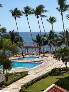 a view of the ocean from the resort at Albatros Cozy Apt in Juan Dolio