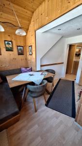 a dining room with a table and some chairs at Landhaus Lehner in Sankt Michael im Lungau