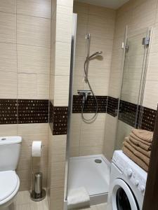 Kúpeľňa v ubytovaní Apartament Maja Zielone Tarasy Kołobrzeg + 31 fotografií