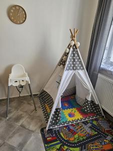 Postel nebo postele na pokoji v ubytování Rodinný apartmán U Kuby