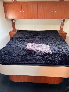 Ένα ή περισσότερα κρεβάτια σε δωμάτιο στο Mobile home