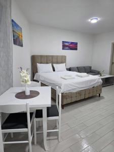 Postel nebo postele na pokoji v ubytování Plavi talas