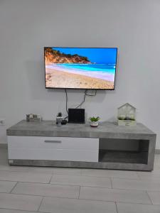 TV a/nebo společenská místnost v ubytování Plavi talas
