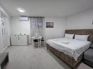 Postel nebo postele na pokoji v ubytování Taksim Aprartman