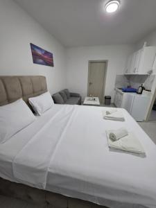 Postel nebo postele na pokoji v ubytování Plavi talas