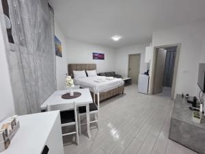 Postel nebo postele na pokoji v ubytování Taksim Aprartman