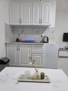 Kuchyň nebo kuchyňský kout v ubytování Taksim Aprartman