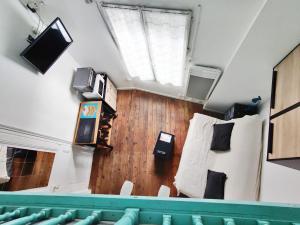 an overhead view of a room with a room with at Le petit cocon au bord de mer in Mers-les-Bains