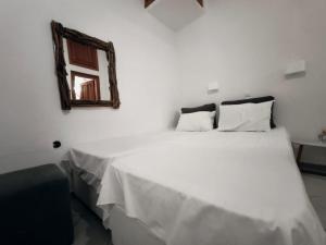 Postel nebo postele na pokoji v ubytování Maria Eleni Guesthouse