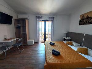 Televízia a/alebo spoločenská miestnosť v ubytovaní Villa Matea - Vir