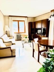 TV a/nebo společenská místnost v ubytování Nido tra monti