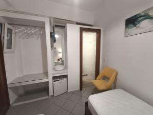 Postel nebo postele na pokoji v ubytování Maria Eleni Guesthouse