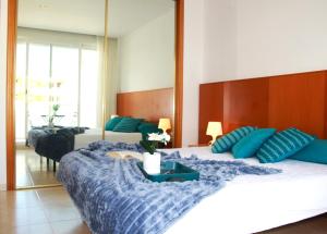 En eller flere senge i et værelse på Villa Belén playa , piscina privada + 32 billeder