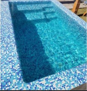 Bazén v ubytování Muma Residence in Chapala nebo v jeho okolí