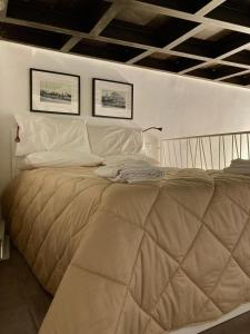 Кровать или кровати в номере San Pietro Classy Old Town Apartment +52 фотографии