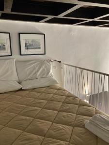 Кровать или кровати в номере San Pietro Classy Old Town Apartment