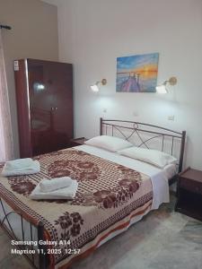 Postel nebo postele na pokoji v ubytování Giorgos House + 20 fotografií