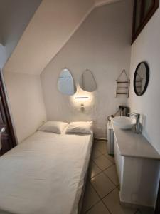 Postel nebo postele na pokoji v ubytování Maria Eleni Guesthouse